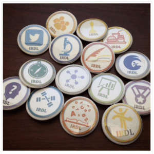 A photograph of the badges used during the in-person IRDL workshops