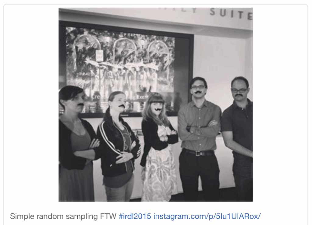 A photograph of the group that won a group prize of stick-on mustaches, for their efforts in visualizing the simple random sampling technique.